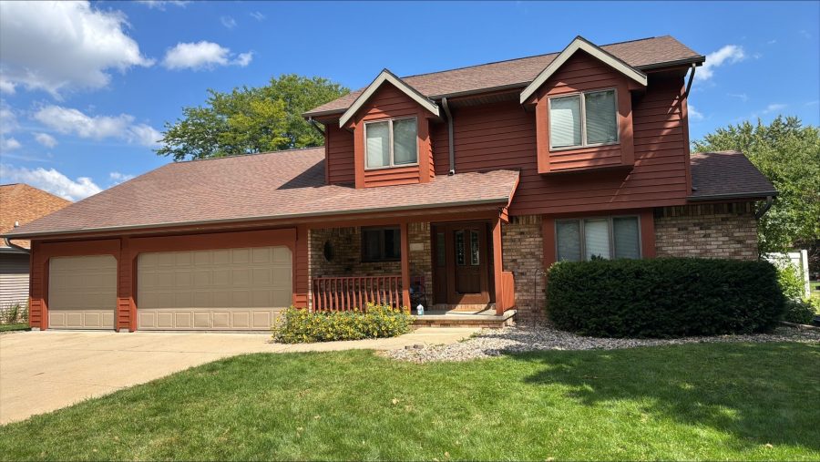 front of house with painted cedar siding