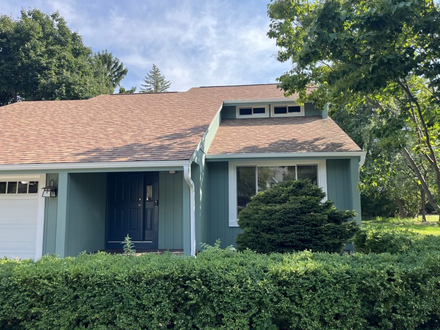 house with light green stained wooden siding Preview Image 1