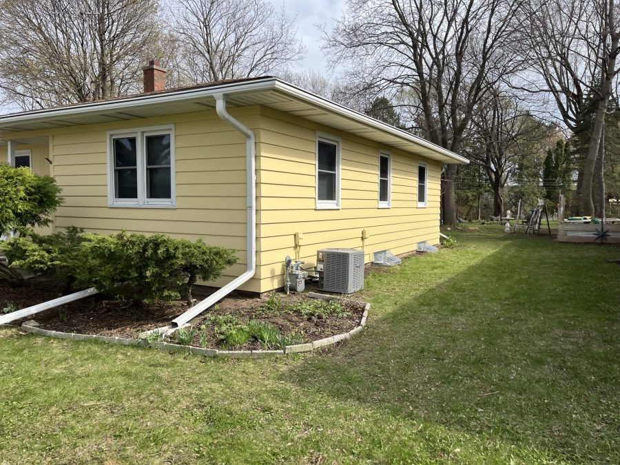 side of yellow painted house Preview Image 2