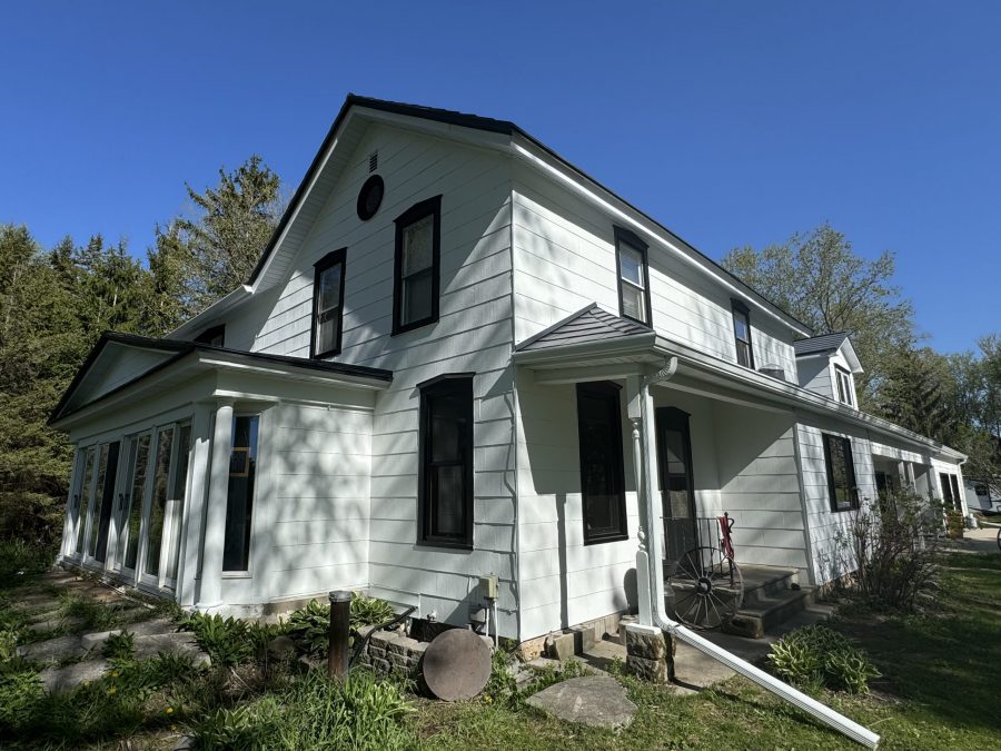 front corner of white painted house