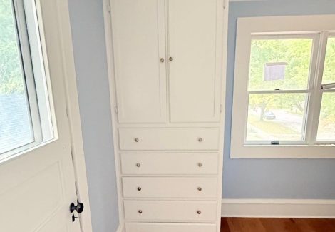 blue painted home interior room with wood floors