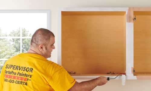 Paint is Applied to Mounted Cabinets