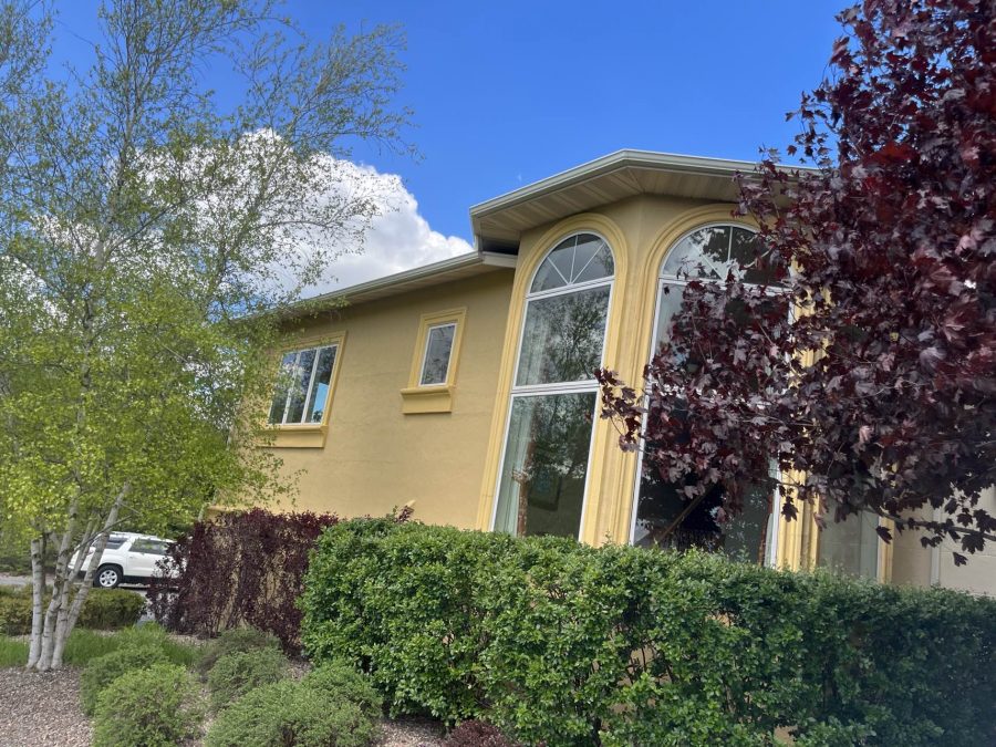 Stucco home exterior and pergola painting in Fond du Lac, WI Preview Image 1