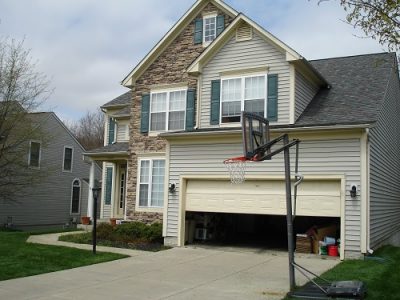Exterior house painting by CertaPro painters in Laurel