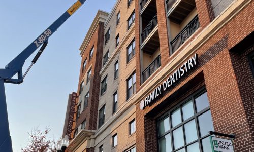 Our Painter on the 80' Straight Boom Lift