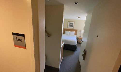 Before View of Interior Hallway of Guest Room