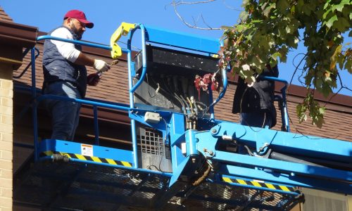 Painter Working on Boom Lift