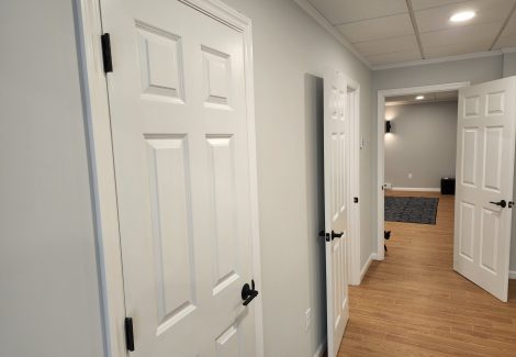 dark door hardware provides contrast.