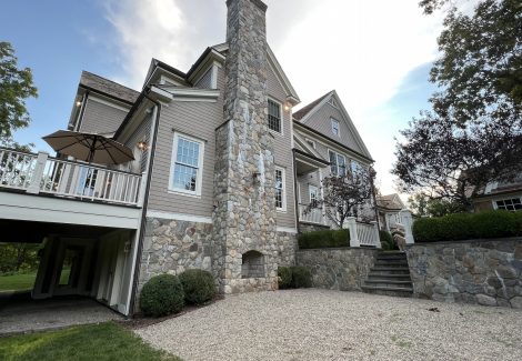 Side of shingle house repainted in Westport, CT.