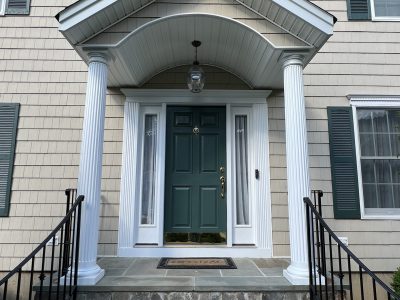 A shingled Colonial repainted in fairfield.
