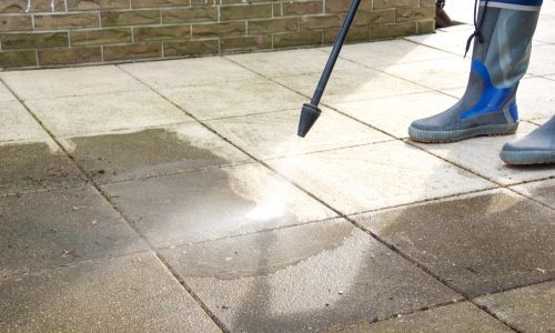 Concrete Surface Being Power Washed