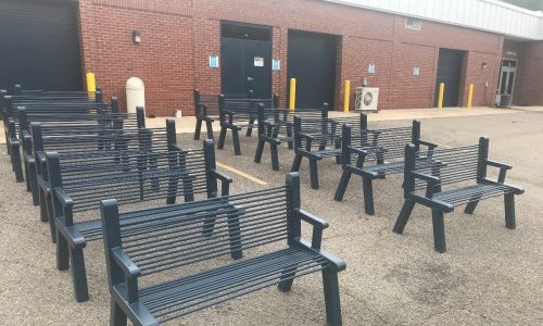 outdoor benches after cleaned and painted black