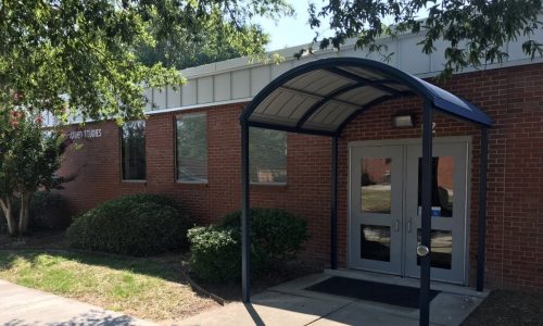 college front entrance after exterior painting