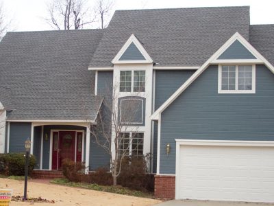 Exterior house painting by CertaPro painters in Fayetteville, AR