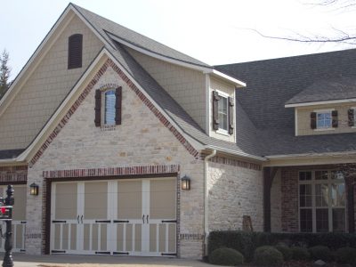 Exterior house painting by CertaPro painters in Fayetteville, AR