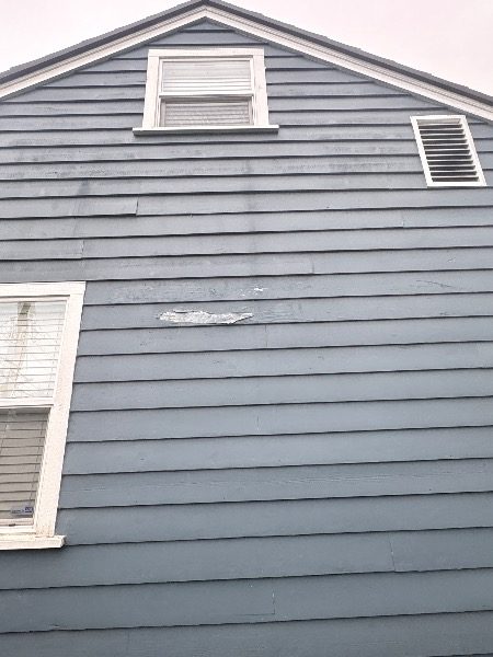 cedar siding with faded and peeling paint Preview Image 12