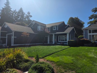 house with blue siding after repaint