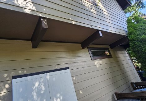soffits and siding on house exterior after repaint