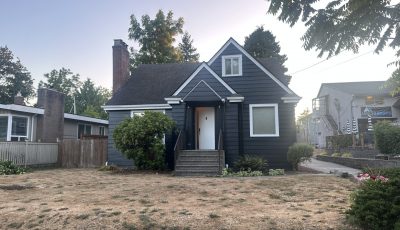 house with blue painted siding and white trim