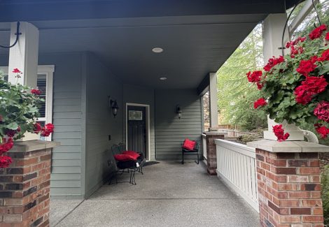 covered front porch before exterior repaint