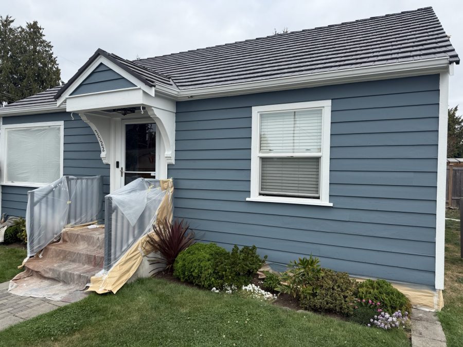 house and detached garage with repainted cedar siding Preview Image 6