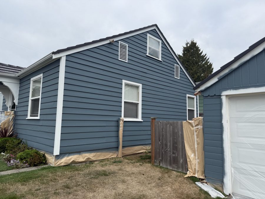 house and detached garage with repainted cedar siding Preview Image 2