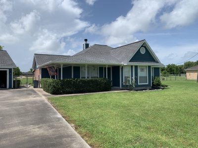 blue and white house painting pearland texas