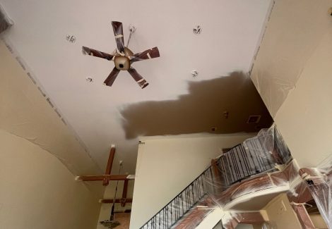 home interior with protective plastic during repaint