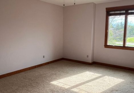 home interior with painted walls and stained beams