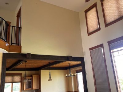 home interior with painted walls and stained beams