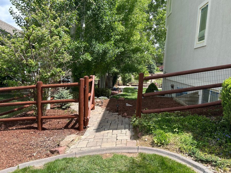 wooden fence surrounding home Preview Image 4