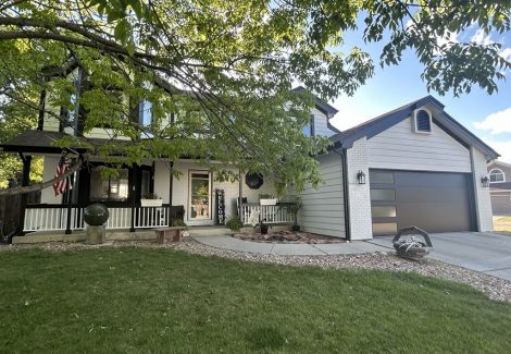 front of painted house and front yard