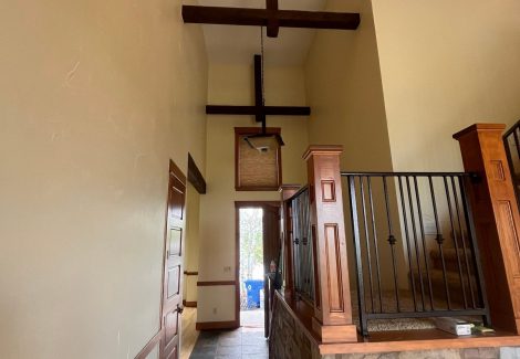 home interior with painted walls and stained beams