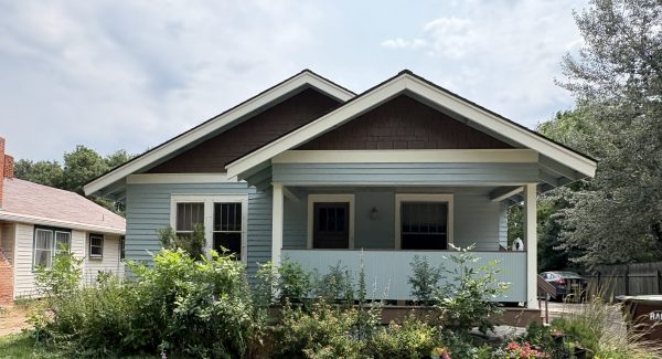 blue house exterior after siding and paint repair