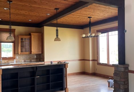 home interior with painted walls and stained beams