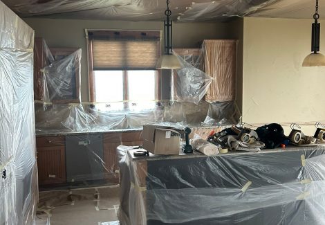 home interior with protective plastic during repaint