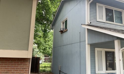 Side of Home Before Painting