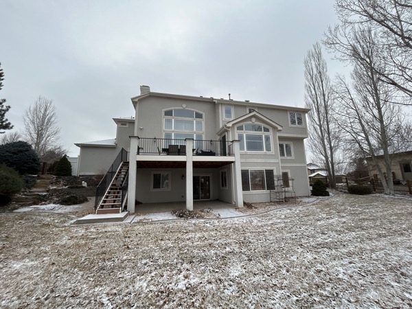 rear of house with snow covered landscaping Preview Image 8
