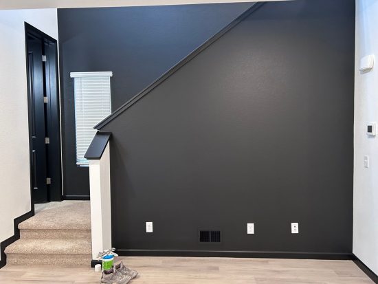 black painted home stairway wall