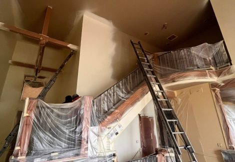 home interior with protective plastic during repaint
