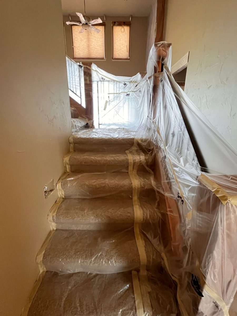 home interior with protective plastic during repaint Preview Image 23