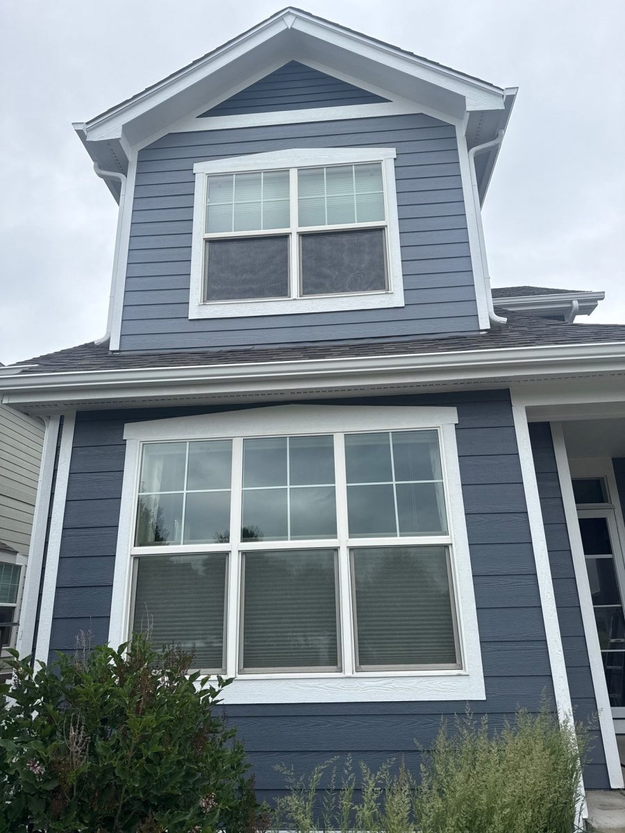 front of house with blue-grey siding Preview Image 1