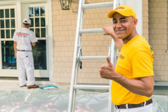 certapro painter team member giving thumbs up