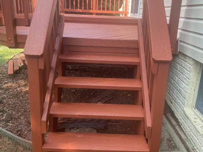 painted outdoor wood steps leading to deck