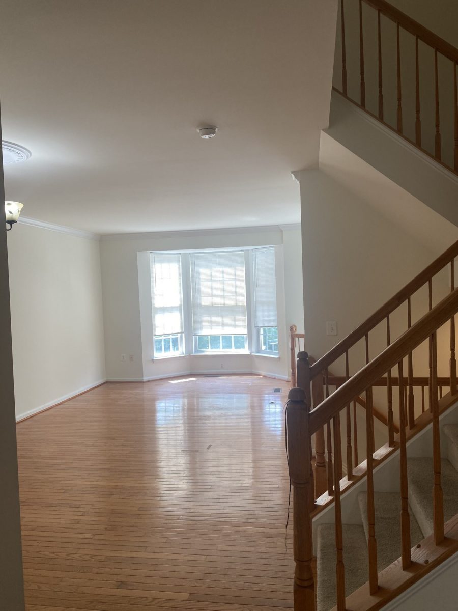 big room with large windows interior neutral colors