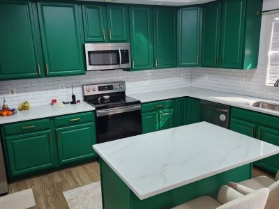 home kitchen with green painted cabinets