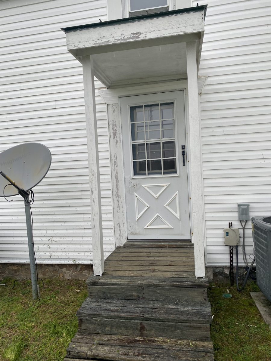 home with white siding before painting Preview Image 1