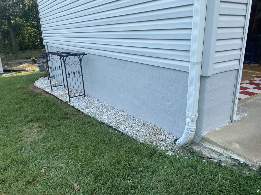 home with white siding and brick foundation Preview Image 1