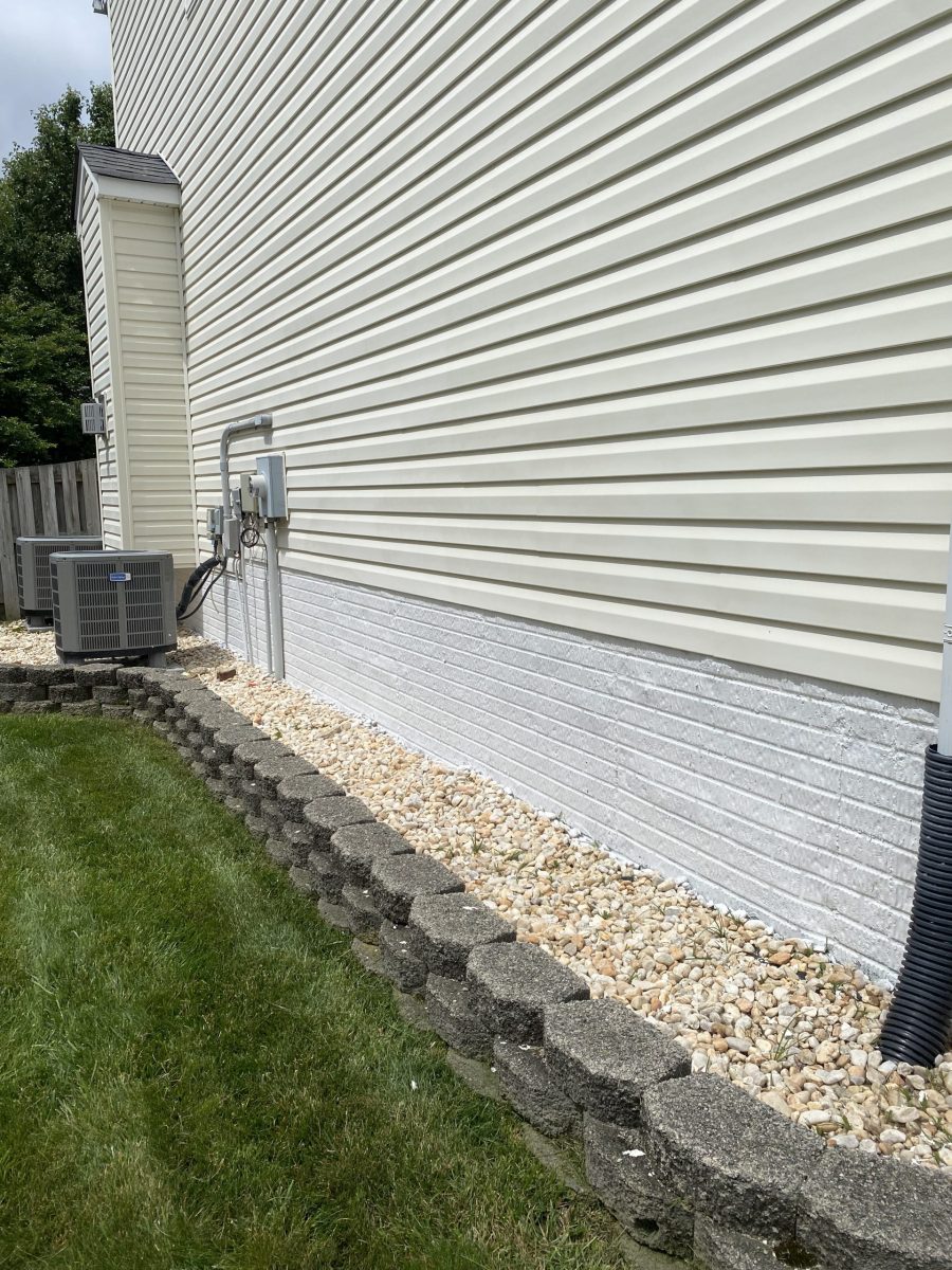 home with white siding and brick foundation Preview Image 4