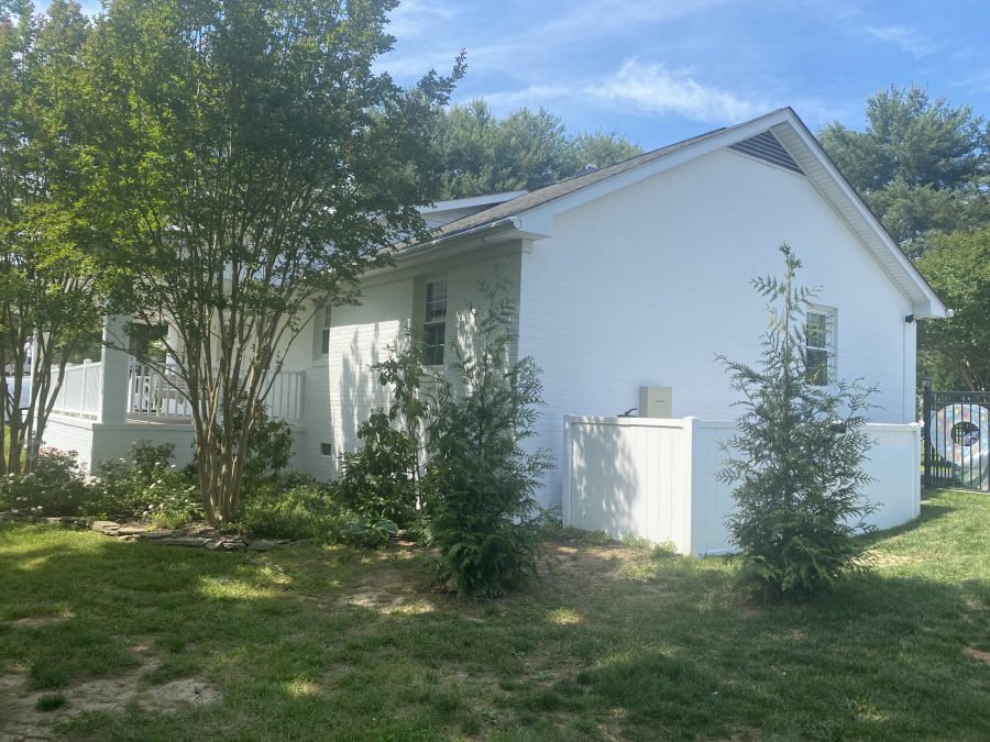 white brick home exterior painted by certapro side view Preview Image 1
